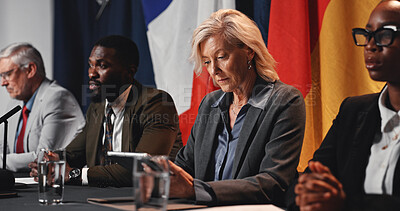 Buy stock photo Press conference, tablet and woman with group for delegation, international government and panel. Summit, people and politician at speech event for diplomacy discussion, global forum or policy update