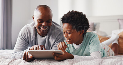 Buy stock photo Tablet, relax and father with child on bed in home for watching movie, series or show together. Happy, bonding and African dad with kid for streaming film on digital technology in bedroom at house.