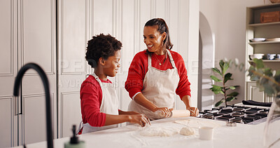 Buy stock photo Christmas, mother and child with baking in kitchen for festive cookies, teaching recipe and help. African family, people or rolling pin in home for dough preparation, xmas snacks or holiday tradition