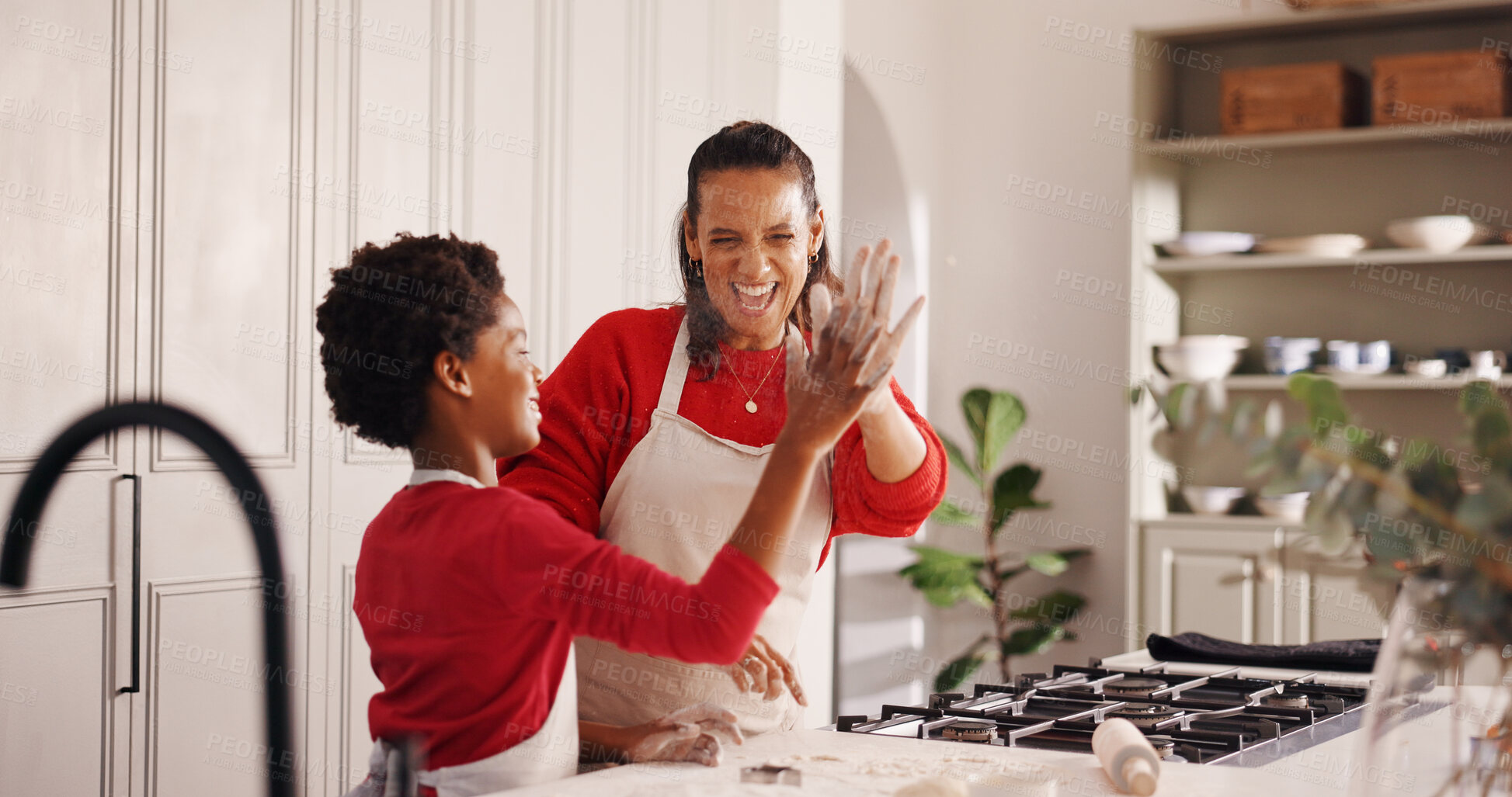 Buy stock photo High five, baking and mother with child in kitchen for christmas cookies, dessert or cake together. Happy, cooking and mom teaching boy kid with celebration for festive biscuits with bonding in home.