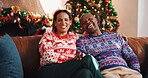 Christmas, portrait and interracial couple with laugh, tree and love in living room of home together. Joke, smile and man with woman, xmas and holiday or vacation bonding for festive season tradition