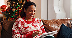 Christmas, home and woman on sofa with tablet, online shopping and festive smile in lounge. Xmas, person and vacation on couch with tech, holiday season and internet sale or deal with website info