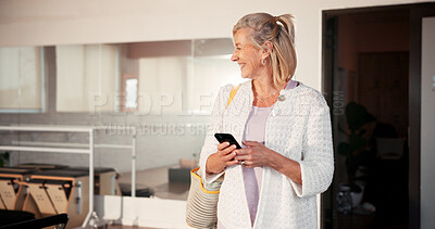 Buy stock photo Thinking, smartphone and woman in studio, fitness and smile with digital app to track progress. Happy, laughing and mature person in wellness center, cellphone and social media with connection