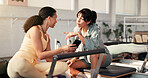 Happy, women and friends with phone for pilates with fitness app, training tips and track progress. People, talk and reformer with mobile, explain technique and video demonstration for online program