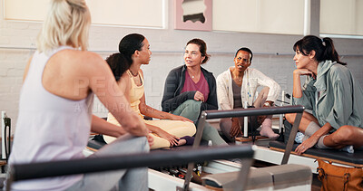 Buy stock photo Woman, group and fitness with talk at pilates class, listen and support for conversation at gym. People, friends and discussion with tips, chat or advice with routine, exercise and wellness at club