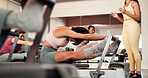 Reformer, stretching and women in studio, instructor and fitness with pilates training. Healthy people, coach and group in wellness center, machine and exercise with challenge, endurance and balance