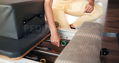 Buy stock photo Hands, springs and woman with reformer machine, exercise and fitness with workout equipment. Getting ready, wellness and alignment adjustment with person for mobility, class and prep with pilates