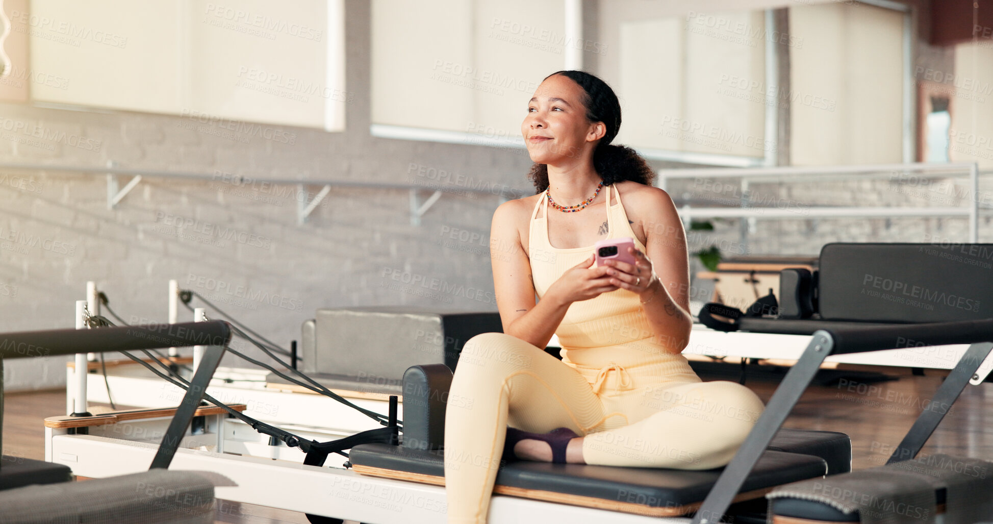 Buy stock photo Thinking, smartphone and woman in studio, fitness and relax with digital app to track progress. Decision, connection and healthy person in wellness center, cellphone and social media with internet