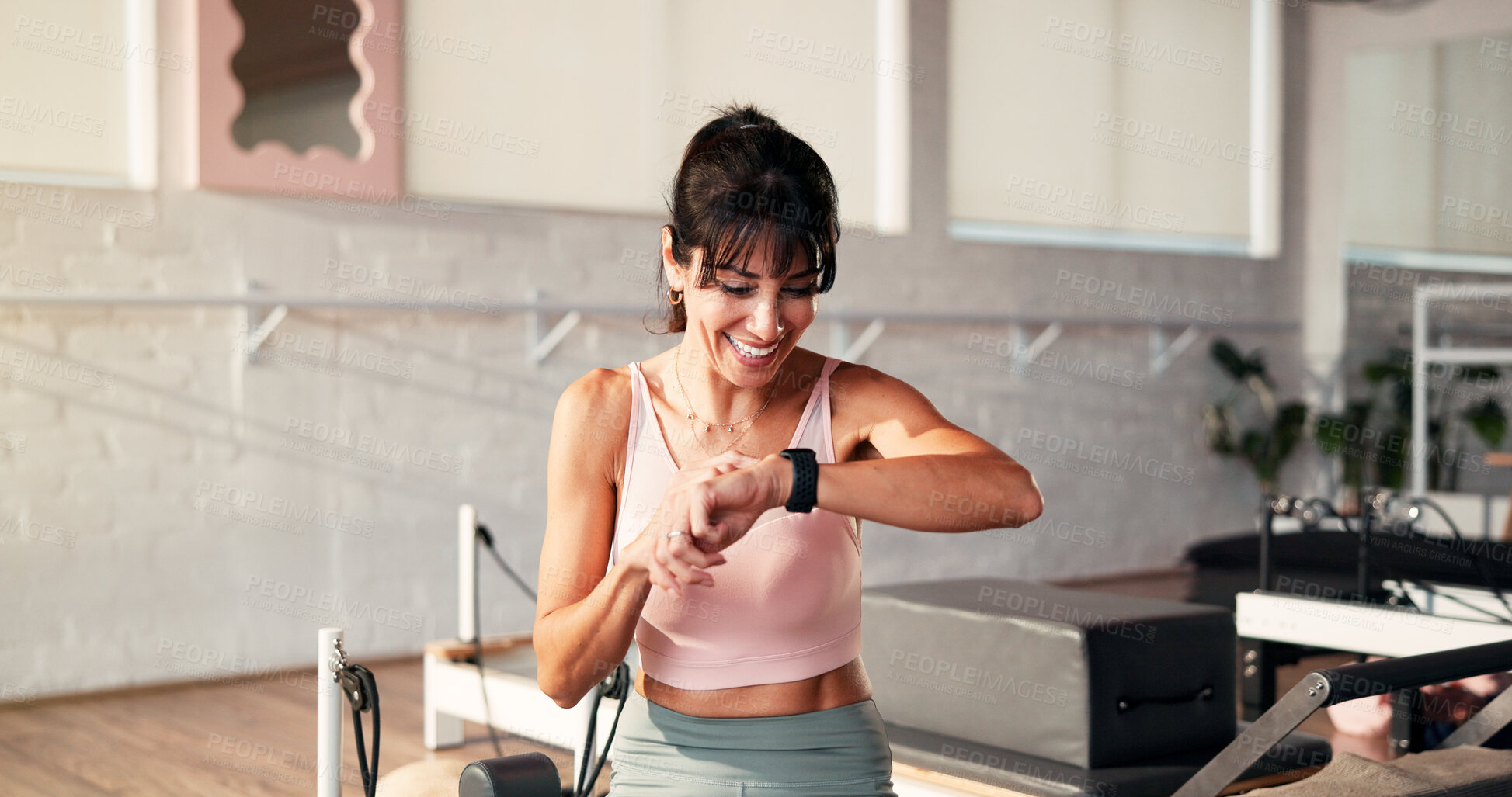 Buy stock photo Happy, woman and smart watch in gym, fitness and tracking workout progress on website or heart rate. Health club, online and mature person with exercise goals, wellness and tech with positive results