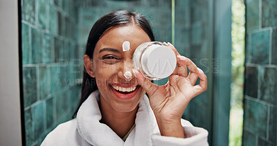 Buy stock photo Skincare, cream and face with woman in bathroom for morning routine, retinol moisturizer and self care. Dermatology, lotion and beauty with person in home for hydration, glow and facial treatment