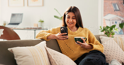 Buy stock photo Woman, phone and relax with coffee on sofa, texting and happy with chat for online dating in home. Person, smartphone and smile with cup, drink or mobile app for social network on couch at house