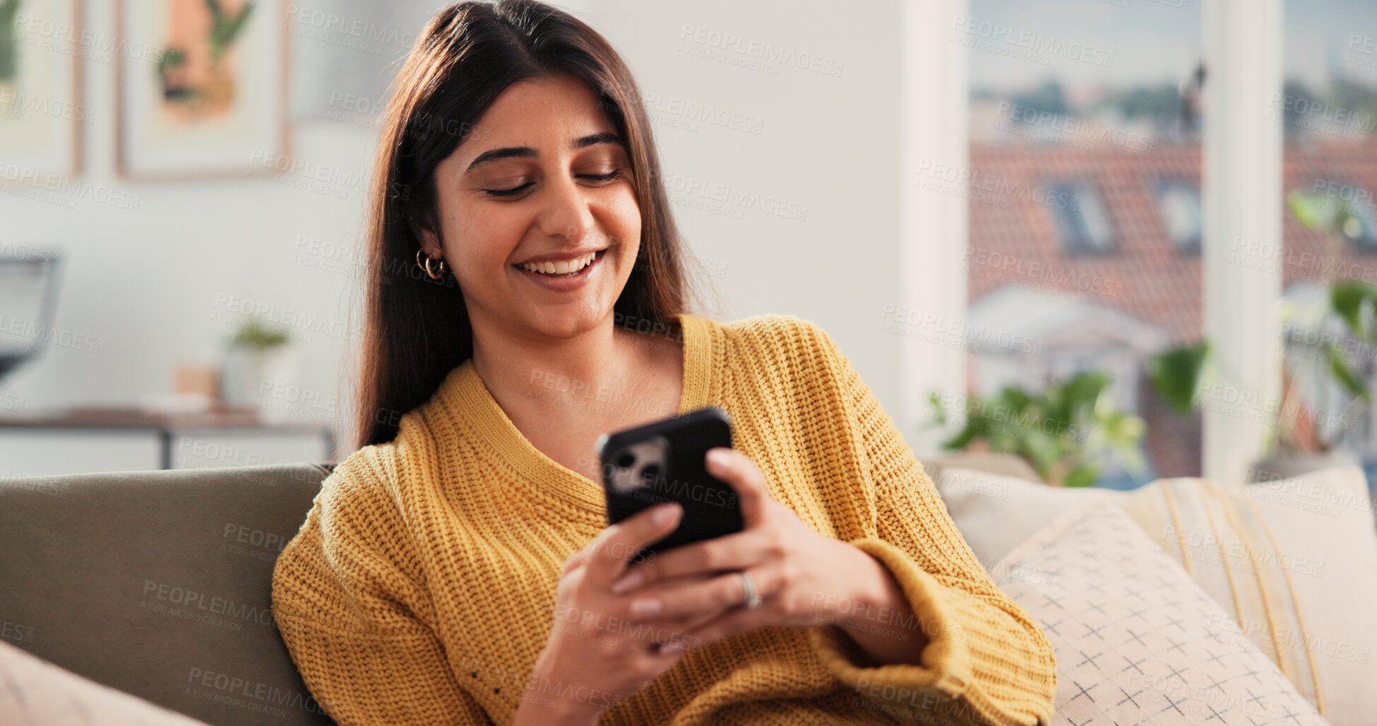 Buy stock photo Phone, happy and woman on sofa in home with networking, communication or social media on mobile app. Smile, relax and female person with cellphone for texting, contact or chatting in living room.