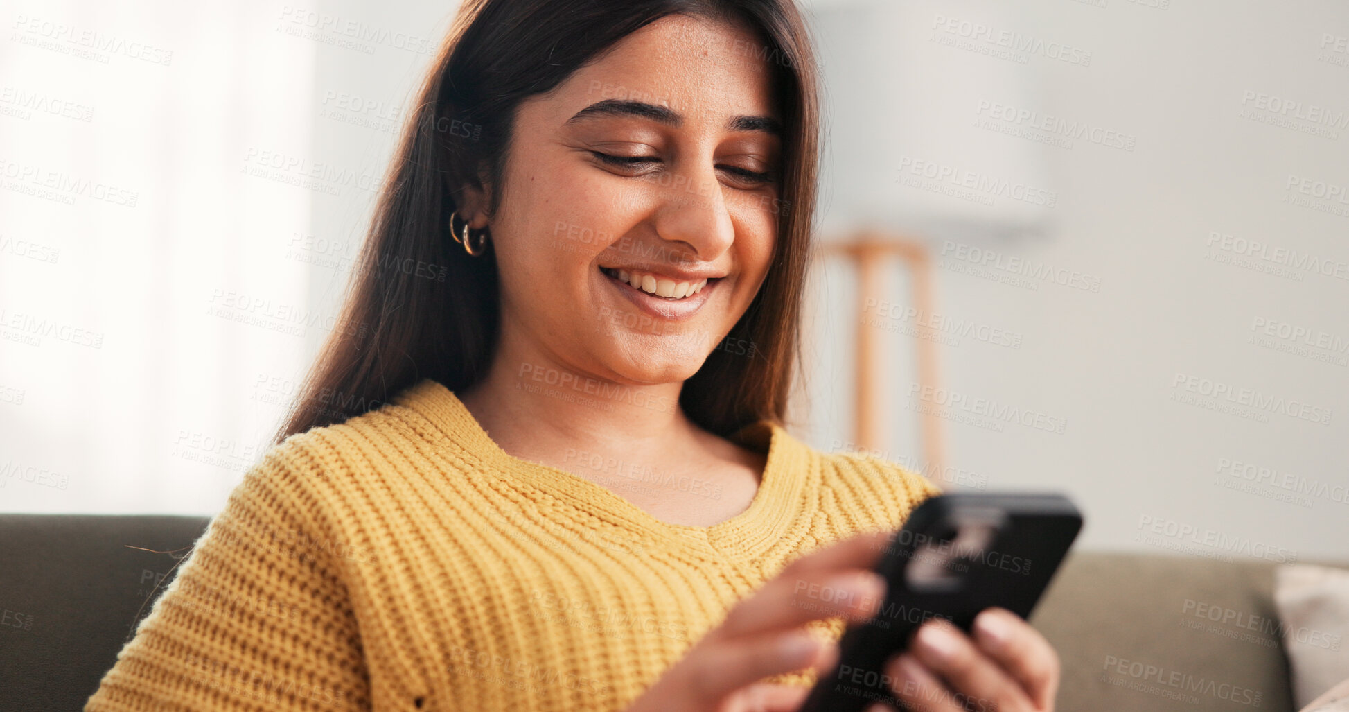 Buy stock photo Phone, laugh and woman on sofa in home with networking, communication or social media on mobile app. Happy, relax and female person with cellphone for texting, contact or chatting in living room.