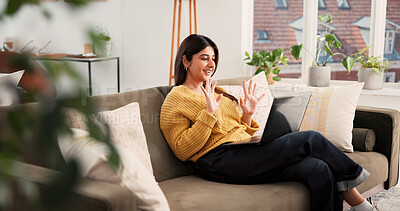 Buy stock photo Laptop, waving and woman on video call on sofa in home with communication, freelance or online meeting. Computer, greeting and female person on virtual discussion with remote work in living room.
