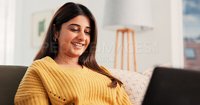 Buy stock photo Woman, laughing and watching movie in home with laptop for entertainment, comedy series and film. Happy, female person and with computer on sofa for streaming service, funny show or relax on weekend.