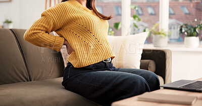 Buy stock photo Back pain, stretching or woman on sofa with laptop, joint inflammation or spine injury in remote work. Bad posture, WFH or freelancer in house with ache, muscle fatigue or strain in task management.