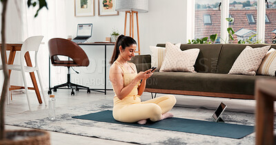 Buy stock photo Fitness, home workout or woman typing with phone, exercise break or replying to message notification. Training pause, texting or person in lounge with mobile app, social media or post wellness status