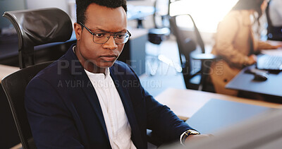 Buy stock photo Computer, reading and report with business man in coworking office for planning or research. Glasses, pc and review with serious employee at desk in professional workplace for admin or feedback