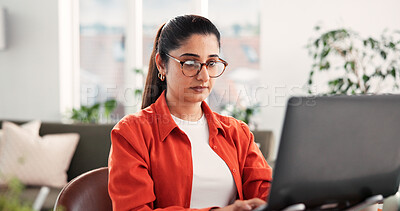 Buy stock photo Reading, laptop and glasses with woman in home office for research, blog writer and copywriting project. Remote worker, article editor and online review with person in living room of apartment