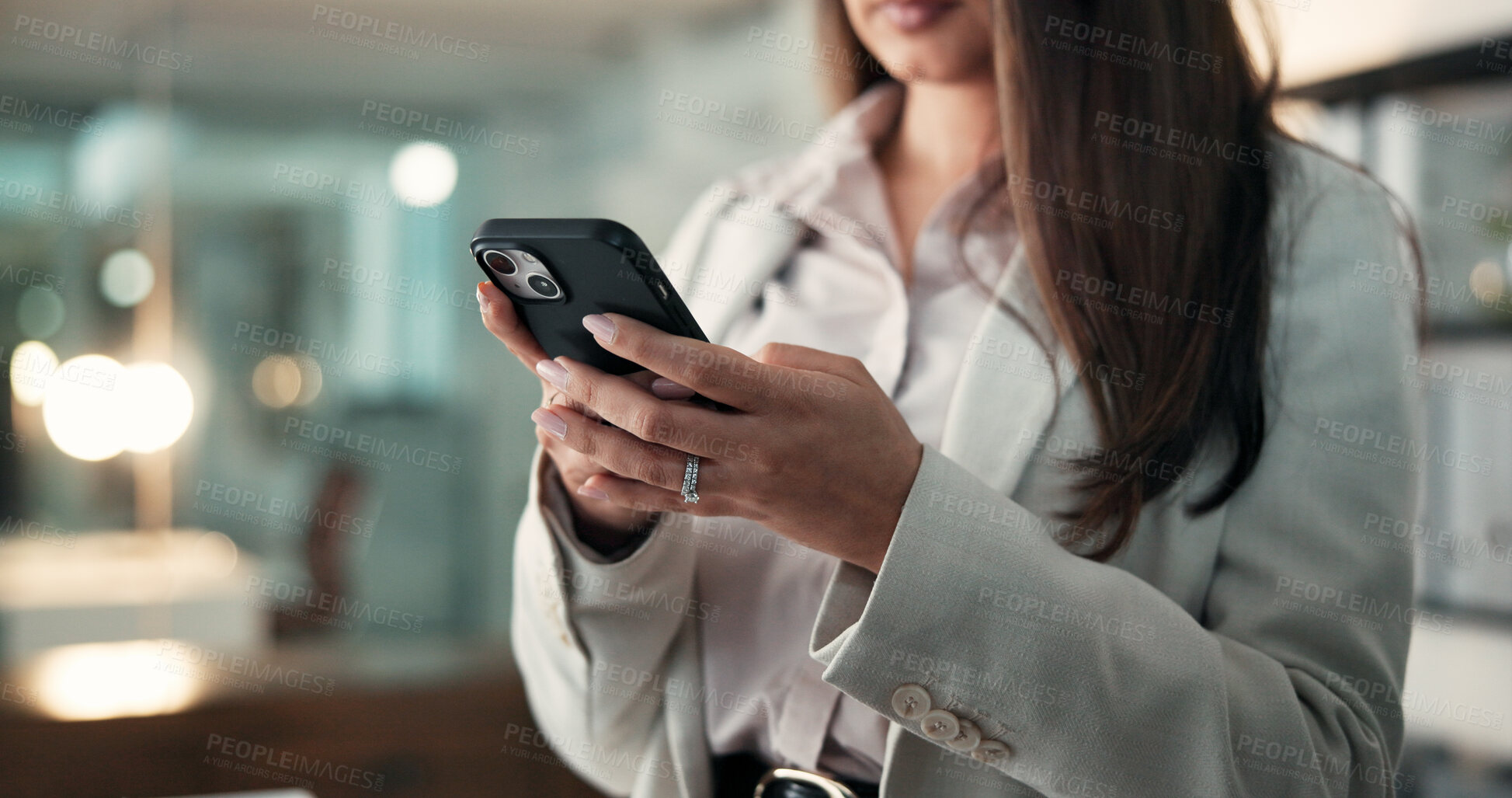 Buy stock photo Office, woman and hands with smartphone, online and communication with contact at night and texting. Typing, person and working late with mobile for message, bokeh and networking on social media