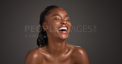 Buy stock photo Beauty, skincare and woman with laughing in studio for natural glow, hydration and healthy skin. Mockup space, black girl and happy on gray background for body care, funny cosmetics joke and wellness