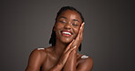 Skincare, happy and black woman in studio with space for natural, wellness and facial glow. Smile, cosmetic and African person with dermatology for health, hydration or collagen by gray background.