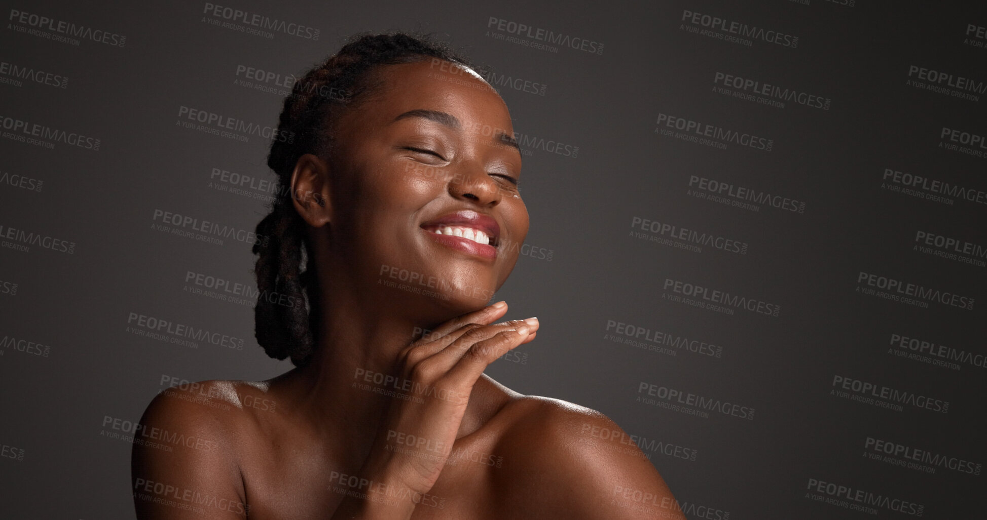 Buy stock photo Skincare, space and happy black woman in studio for hydration, wellness and natural beauty. Mockup, dermatology and person with touch, smile and spa aesthetic for healthy skin on dark background
