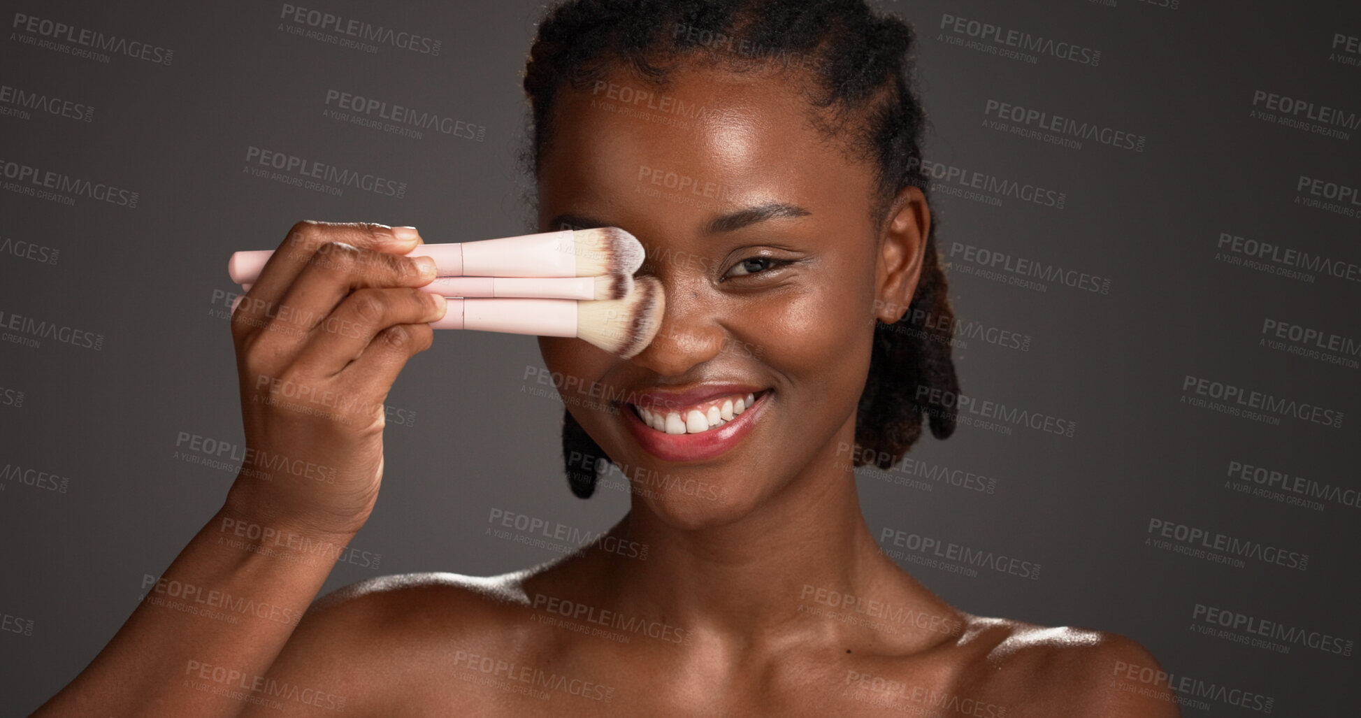 Buy stock photo Brushes, makeup and portrait of black woman in studio for cosmetics, makeover and application. Cosmetology, salon and person with tools for foundation, beauty products or aesthetic on dark background