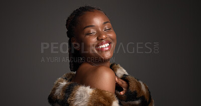 Buy stock photo Beauty, makeup and pride with black woman in studio for aesthetic, cosmetics or fashion. Fur coat, glamor and space with smile of African model isolated on gray background for  luxury makeover
