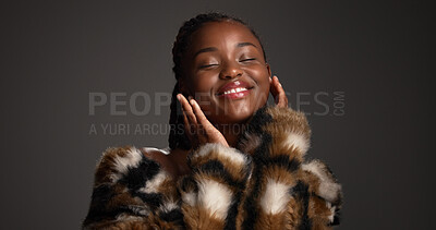 Buy stock photo Luxury makeup, beauty and black woman in studio with self care, glow or glamour with cosmetology. Smile, cosmetics and model with fur coat for aesthetic, makeover and touch face on dark background