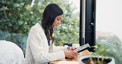 Buy stock photo Reading, remote work and tablet with woman in home for online planning or research at window. App, development and scrolling with freelance employee at desk in apartment for small business startup