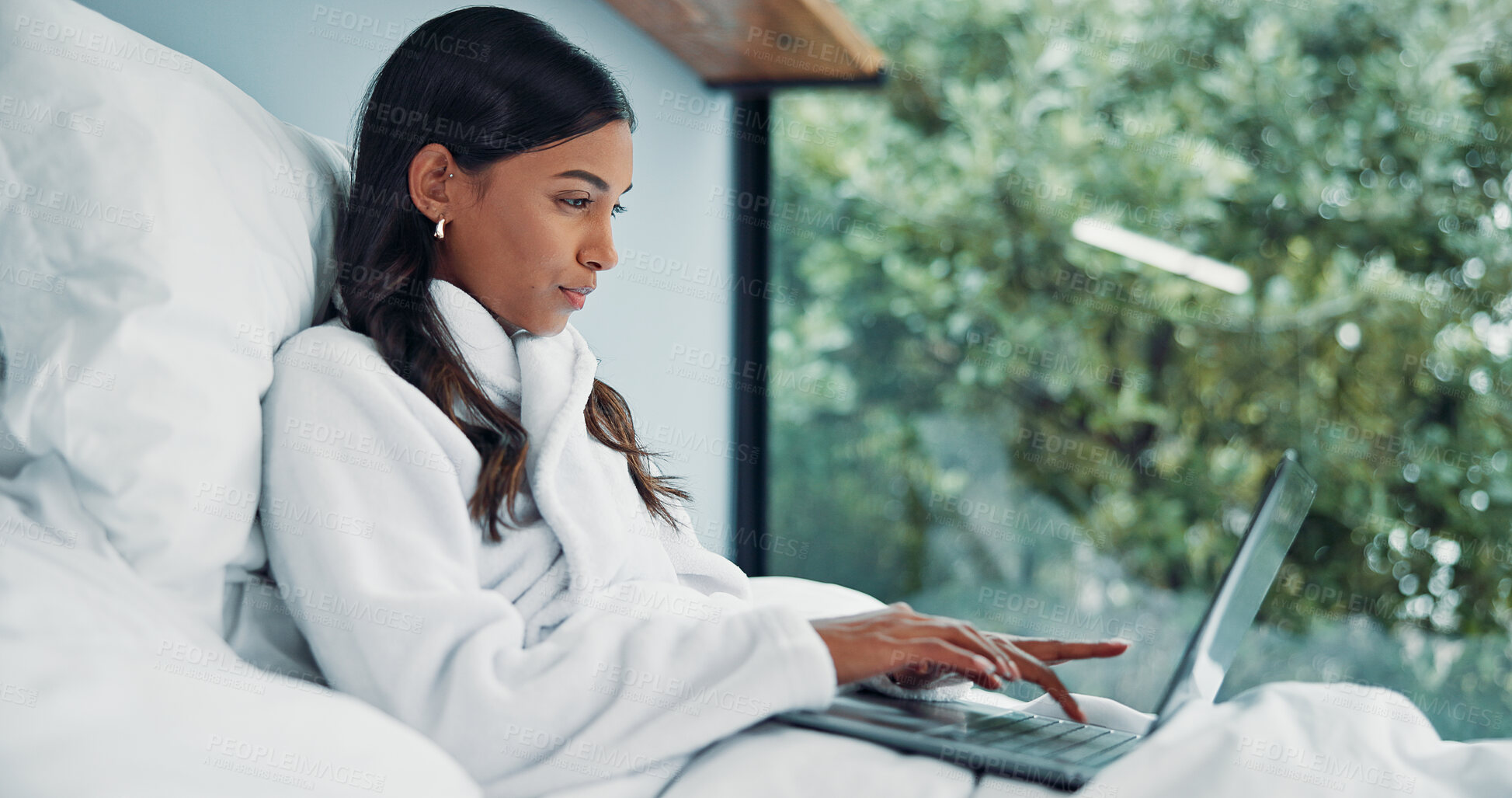 Buy stock photo Woman, typing and remote work in bed with laptop for email feedback, administration and calendar. Freelancer, person and pajamas in home with computer for daily update, schedule and project review.