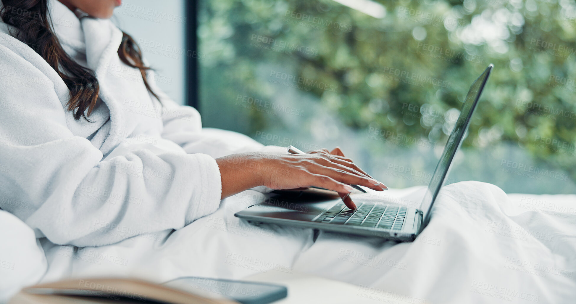 Buy stock photo Freelancer, bed and hands typing on laptop in home for online article, inspiration or writing publication. Remote work, woman and story plot in robe for proofreading, email or response in bedroom