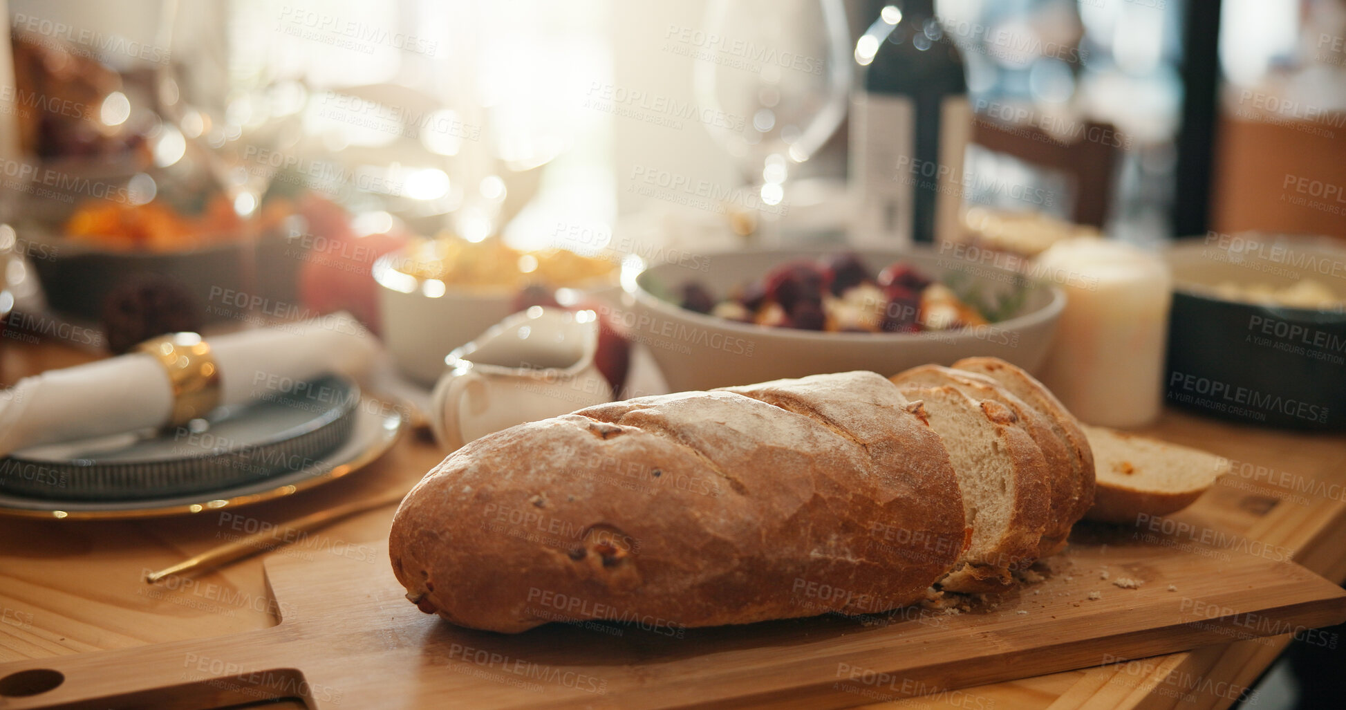 Buy stock photo Table, setup and bread for thanksgiving at house for social gathering, health vegetables and celebration. Baked roll, feast or cuisine layout with place setting, decor and lunch tradition for festive