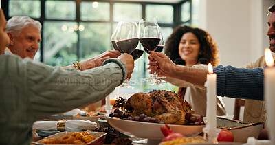 Buy stock photo Christmas, toast and family with wine, home and group with meal in dining room, feast or celebration. Xmas, cheers and people with alcohol for December holiday, gathering and party for festive season