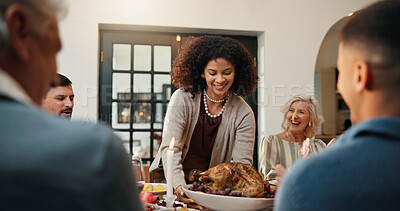 Buy stock photo Serving, family dinner and woman with turkey at table, applause and bonding event in thanksgiving feast. Clap, hosting and group of people in dining room for meal, holiday reunion and happy gathering