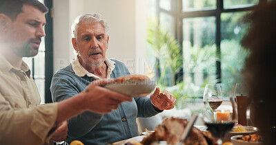 Buy stock photo Serving, family and thanksgiving food in home for holiday lunch, eating together or celebration. Festive feast, sharing or people with social gathering at dining table for tradition, bonding or event