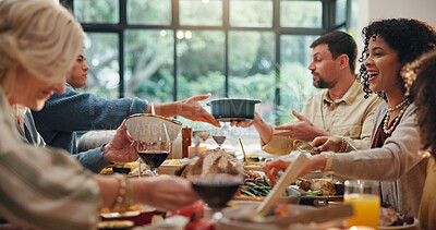 Buy stock photo Home, family and serving thanksgiving lunch for holiday season, eating together or conversation. Festive feast, food or happy people with reunion party at dining table for tradition, bonding or event