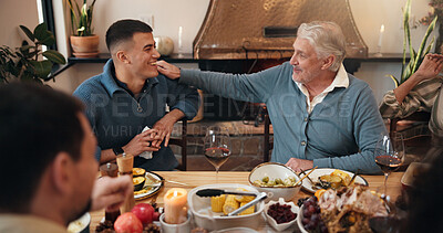 Buy stock photo Conversation, laughing and man with father in dining room of home for Christmas feast together. Celebration, festive and funny with happy family in apartment for holiday season or social gathering