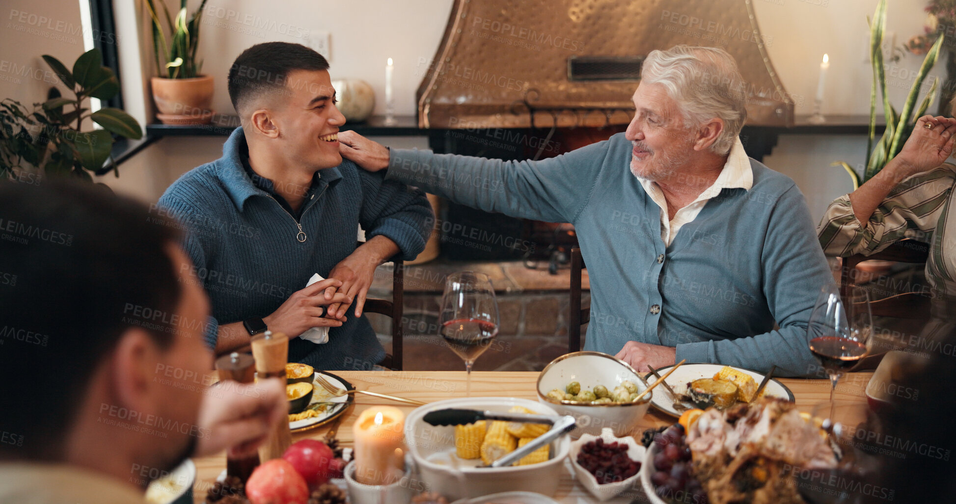 Buy stock photo Conversation, laughing and man with father in dining room of home for Christmas feast together. Celebration, festive and funny with happy family in apartment for holiday season or social gathering