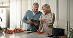Senior, couple and tablet with food in kitchen for cooking recipe, online tutorial or tips in home. Man, woman or research with technology, ingredients or vegetables for meal guide or instructions
