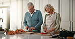 Cooking, help and senior couple in kitchen for lunch, supper and prepare food for bonding in home. Marriage, retirement and old man and woman for meal prep, cutting vegetables and healthy dinner