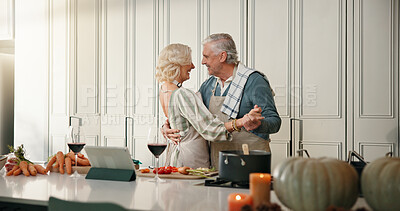 Buy stock photo Cooking, dance and old couple in kitchen for lunch, supper and online recipe for bonding in home. Wine, retirement and senior man and woman for meal prep, tablet and support for anniversary dinner