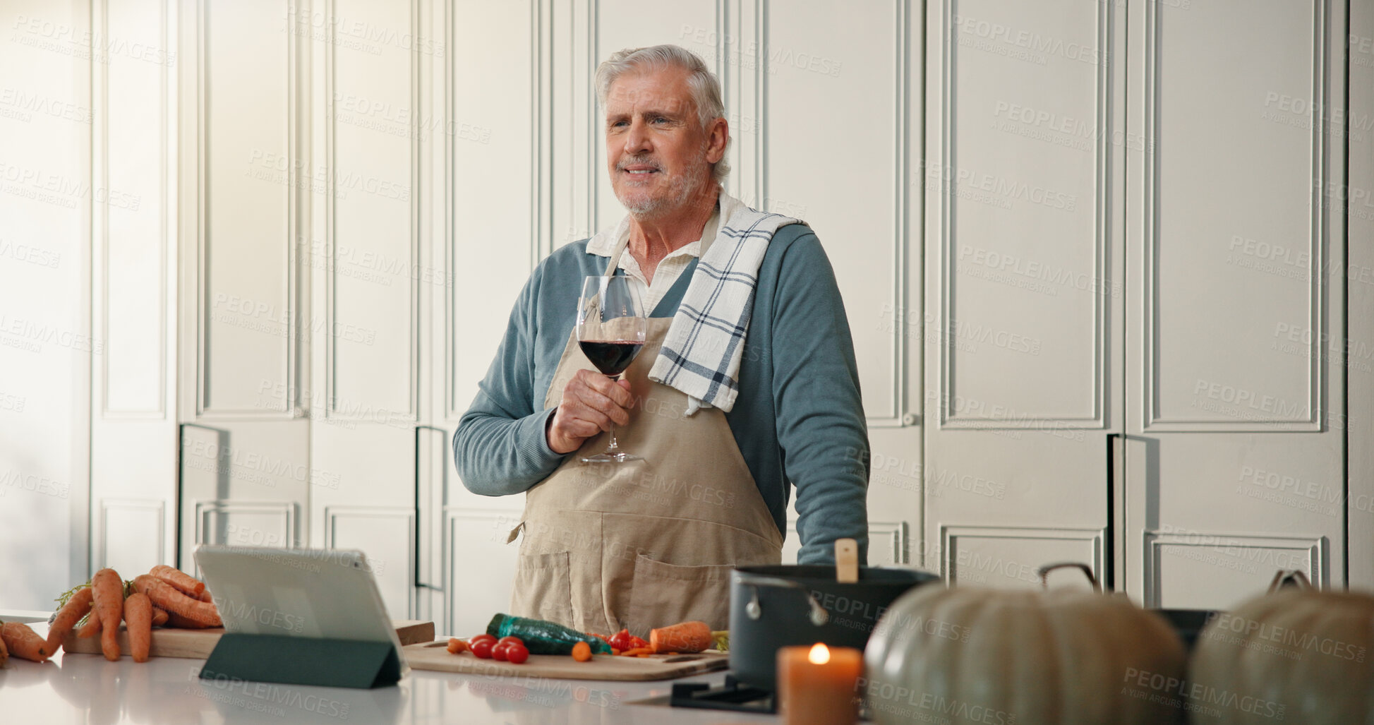 Buy stock photo Cooking, happy and senior man with wine for thanksgiving dinner, holiday or thinking of recipe. Elderly person, alcohol and smile in kitchen for meal prep inspiration, idea and retirement in home