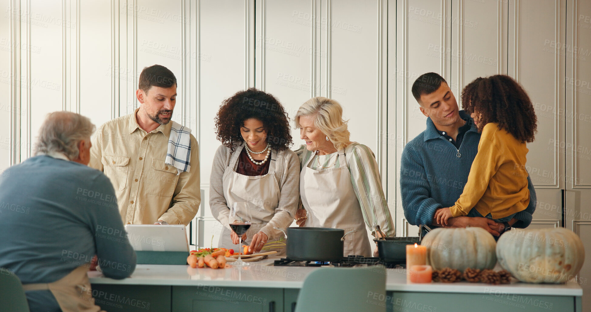 Buy stock photo Kitchen, big family cooking and cut vegetables for thanksgiving dinner with generations. Meal prep, mom and dad with grandparents, kid or interracial people with online recipe to chop carrot in home