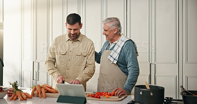 Buy stock photo Cutting, kitchen and senior father with son for support, ingredient preparation and teaching family recipe. Tablet, guidance or men cooking together in home, instructions and healthy food for bonding