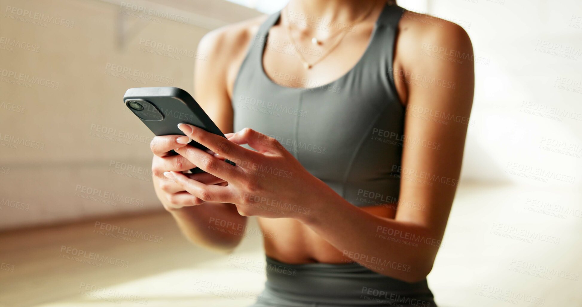 Buy stock photo Fitness app, online and hands with smartphone, gym and workout tracking on website for health goals. Scroll, info and person with mobile, research and exercise tips on social media in wellness center