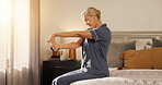 Calm, stretching and woman in bedroom, morning and wellness with lens flare, relax and wake up. Home, pensioner or mature person with muscle relief, flexibility or start day with peace or circulation