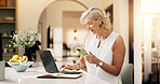 Woman, laptop and typing with phone for project draft, editing article and creative process in home. Remote work, freelance writer and tech for proofreading with mature editor or story development