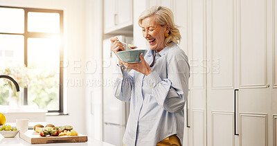 Buy stock photo Senior woman, fruit salad and eating in kitchen, smile and excited with organic vegan meal at home. Mature person, happy and laugh with bowl for nutrition, diet and wellness in retirement at house